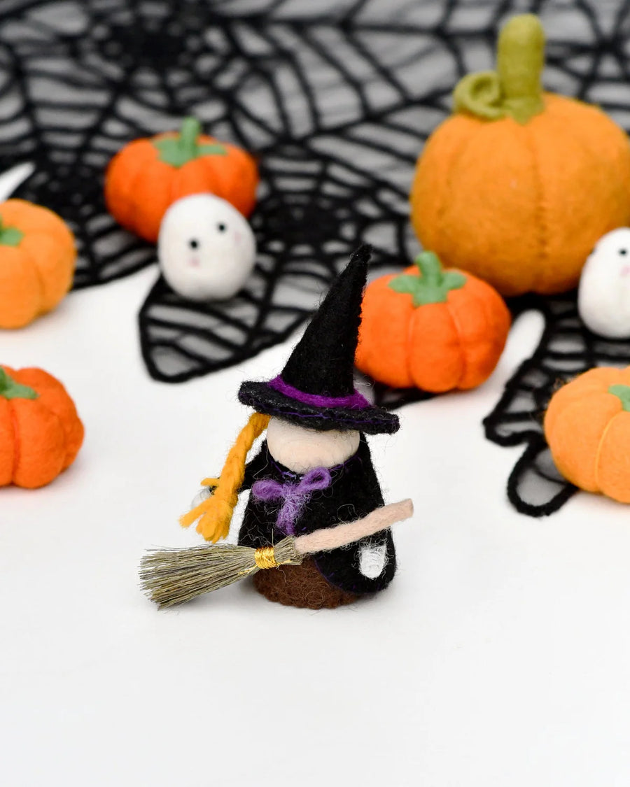 Second view of the felt witch peg doll with her broom