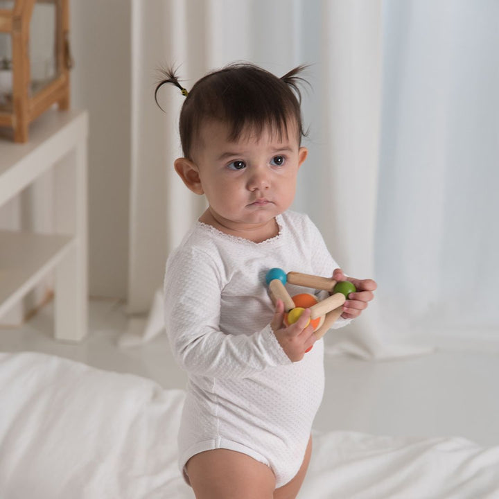 Plan Toys Triangle Clutching Toy