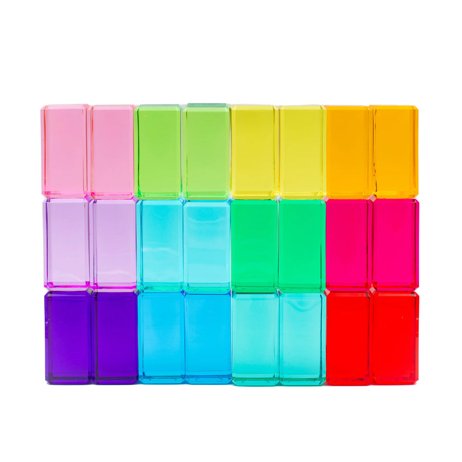 Bauspiel Luminous Blocks, 24 pieces in 12 colors, laid out in rows
