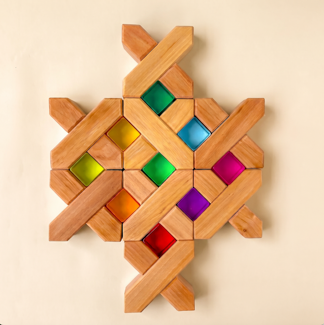 Bauspiel X-Blocks built into a flat pattern framing colored lucent cubes
