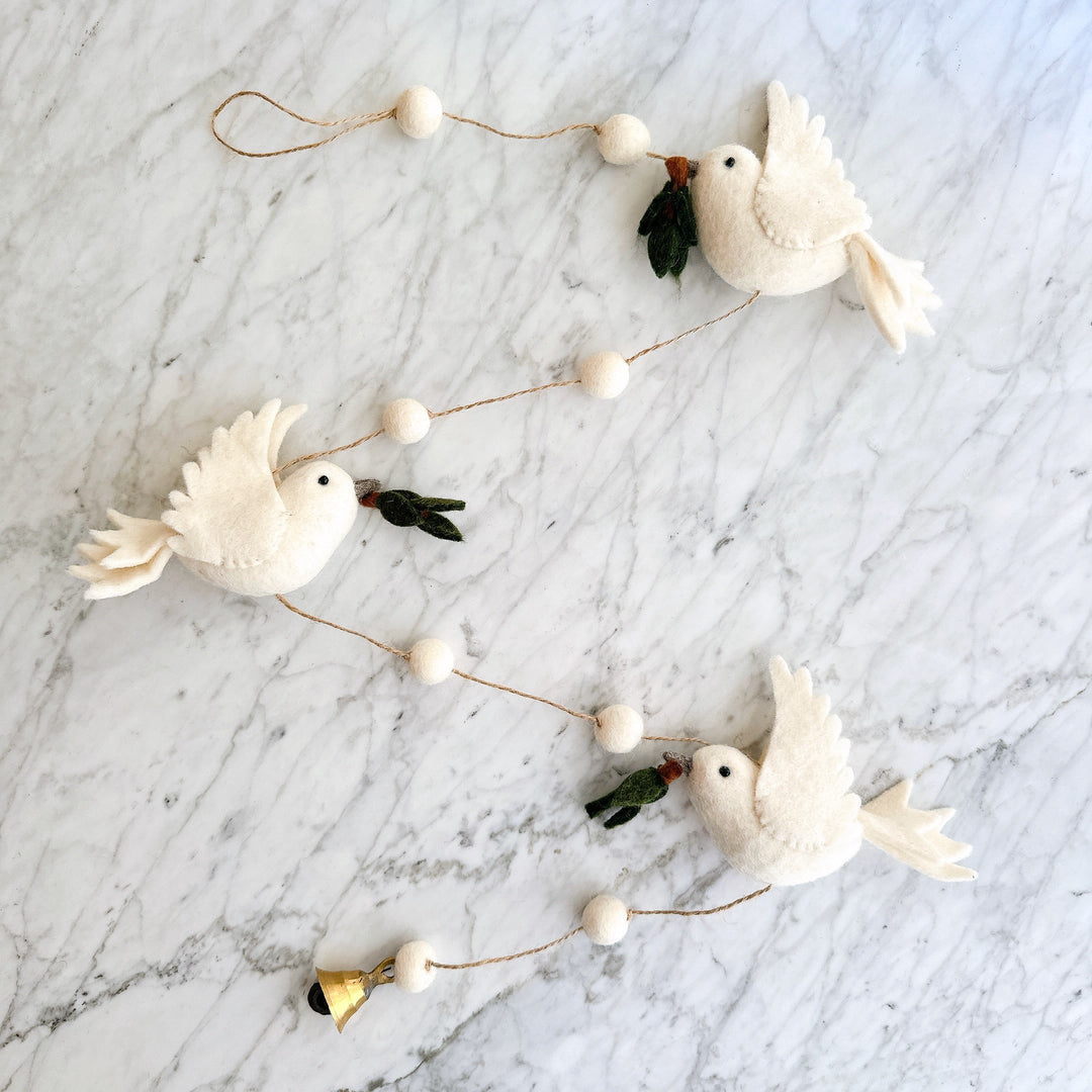 Handmade felt garland with white doves and olive twigs