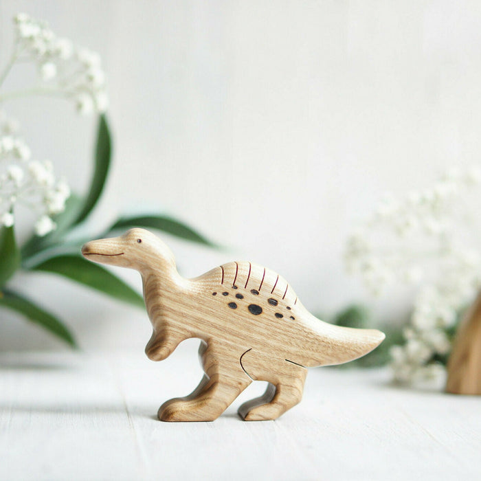 Wooden Spinosaurus, a natural wood animal toy by Tiny Fox Hole, cut and finished by hand from solid wood