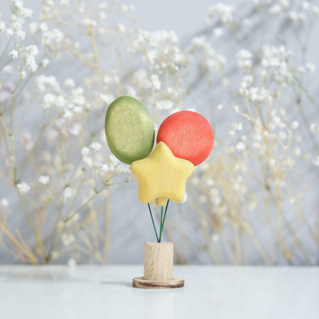 Wooden Balloon Ornament, Green Sparkle, a wooden Waldorf celebration piece by Tiny Fox Hole, cut and finished by hand from solid wood