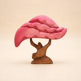 Wooden cherry tree with a pink blossom canopy carved in layers on a brown trunk · view 1