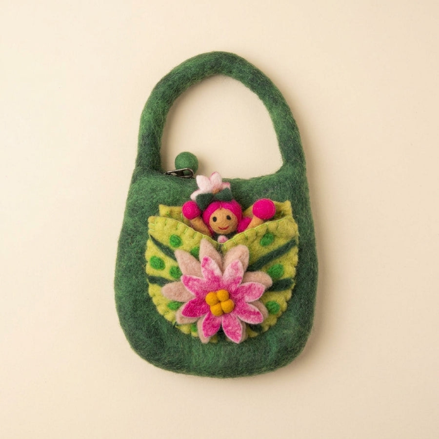Green hand-felted wool bag with a lime lily pad pocket and a pink water lily, a felt fairy peeking out of the pocket