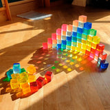 Bauspiel Lucent Cubes built into a glowing rainbow arch on a sunny wooden floor · view 5